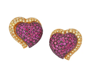 A pair of heart shaped ruby and yellow diamond earrings, designed as a pavé ruby set heart shaped panel, with pavé yellow diamond set asymmetric border, to h