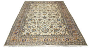 
	
		An Iranian Kashan pattern carpet, late 20th century, with all over design in ivory field,...