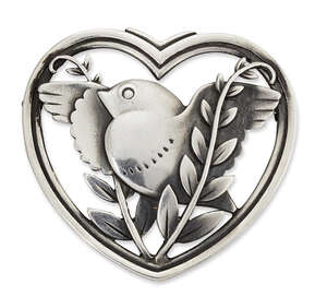 
	
		Arno Malinowski (1899-1976) for Georg Jensen, a silver heart-shaped brooch with bird
		
