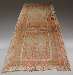 
	
		A large Afghan Kelim carpet, mid-20th century, decorated with three square geometric...