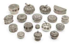 
	
		Seventeen Eastern white metal boxes, early 20th century, some modelled as fruit, some...