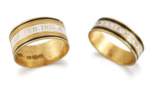 
	
		Two George III gold and enamel mourning rings, both with with white enamel bands with...