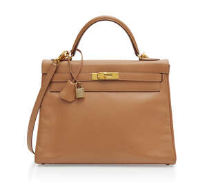 
	
		Hermes, a 'Kelly' 32 cm Box-leather handbag
		Blind stamp for 2001, marked Hermes Paris,...
