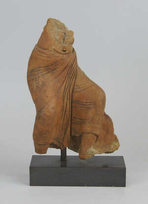 
	
		An Indian terracotta lower torso of dancing girl, on a metal stand, the torso 22.5cm...
