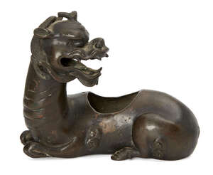 
	
		A Chinese bronze censer, Ming dynasty, 17th century, modelled as a recumbent kylin with...