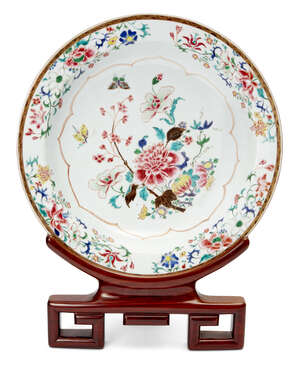 
	
		A large Chinese porcelain charger, Yongzheng period, painted in famille rose enamels with...