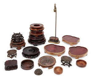 
	
		A collection of Chinese hardwood stands, 18th-20th century, one with wire-inlay depicting...