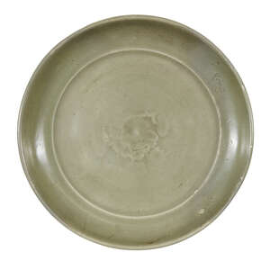 
	
		A Chinese Longquan celadon dish, Ming dynasty, 15th/16th century, covered in a thick...