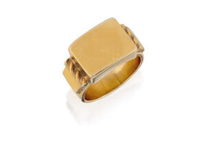 A large, 1940s gold signet ring, of saddle shaped design, ring size T