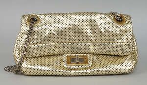 
	
		Chanel: a gold perforated metallic lambskin leather  flap bag, with two tone hardware,...