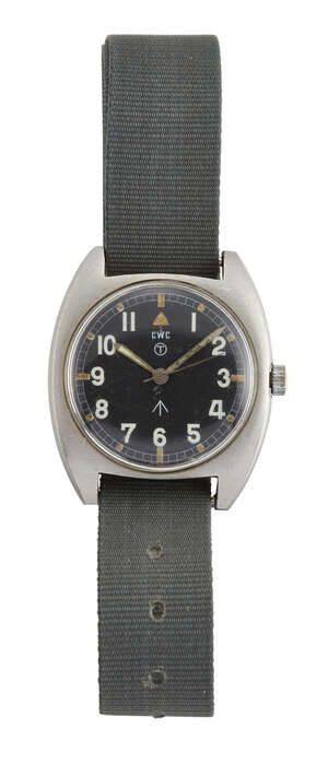 
	
		A 1980s, stainless steel, British military issue W 10 wristwatch by CWC, the black enamel...