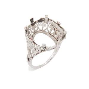 An early 20th century platinum diamond set ring mount with vacant principal collet,&nbsp;the...