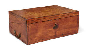 
	
		A George III satinwood oblong desk box, the ebony strung lid and body opening to reveal a...