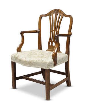 
	
		A George II mahogany armchair, the serpentine top rail, above pierced and waisted splats,...