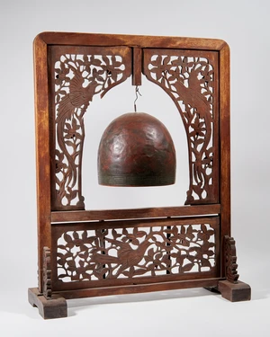 A Chinese hardwood gong, 20th century, the rectangular frame with carved and pierced decoration,...