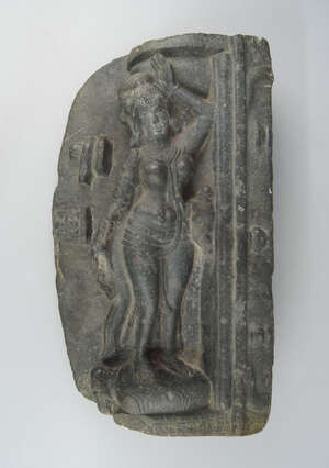 
	
		A large black stone architectural fragment of an Indian dancing girl, modelled wearing a...
