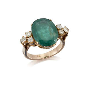 An emerald and diamond ring, The single claw-set oval mixed-cut emerald weighing approximately 7.30 carats, with circular-cut diamond three stone cluster shoul