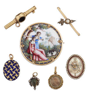 A group of jewellery comprising: an 18th century mourning brooch, the rock crystal face with seed pearl surround enclosing an intricately designed flower and f