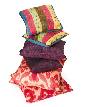 A group of seventeen cushions by Robert Kime Ltd., comprising: a pair of modern Ikat cushions,...