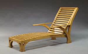 
	
		A sycamore reclining lounge chair, late 20th Century, the slatted backrest and seat with...