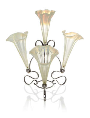 
	
		An Art Nouveau electroplated and glass trumpet epergne 
		c.1910, partial stamped marks...