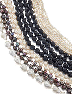 Four cultured pearl necklaces, comprising: a baroque cultured pearl single row necklace, length 47.5cm, detached; a cultured pearl single row necklace with sma