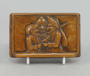 
	
		A Continental burr wood snuff box, probably early 19th century, the hinged cover carved...