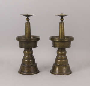 
	
		A pair of Syrian bronze pricket sticks, 18th/19th century, 30cm high (2)

	

