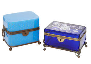 
	
		A Continental blue glass rectangular casket, 19th century, decorated in opaline enamels...