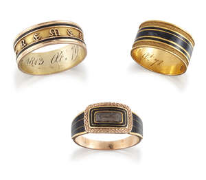 
	
		Three George III gold and enamel mourning rings, comprising: a broad band with triple...