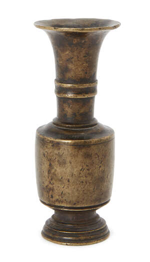 
	
		A Chinese bronze miniature long-necked baluster vase, 17th century, the cylindrical...