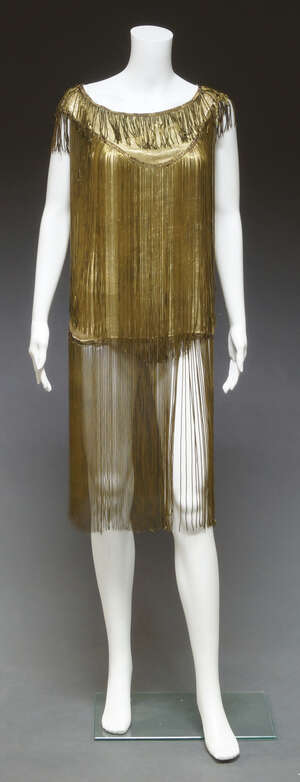 
	
		A 1920 gold lame cocktail dress, with gilt metal fringing 

	

