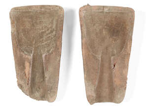 Two Chinese clay bronze moulds, Shang dynasty, probably for a farming tool, with broad tapered...