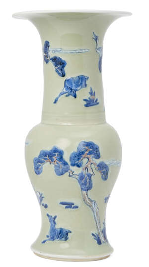 A Chinese porcelain celadon yen yen vase, Kangxi period, painted in underglaze blue and copper red with deer and cranes amid pine trees and lingzhi sprigs, und