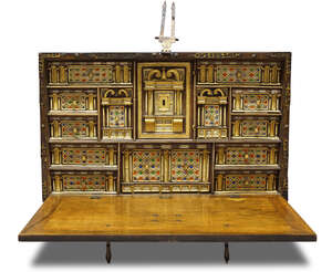 
	
		A Spanish walnut vargueno cabinet, 17th century, with gilt metal handles and mounts, the...