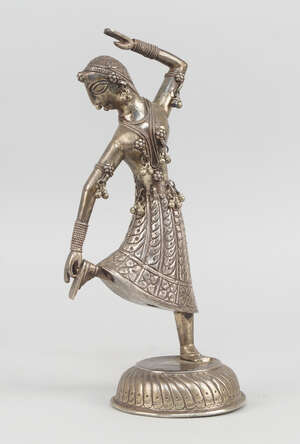 
	
		A silver model of a dancing lady, Indian, 20th century, modelled wearing trailing...