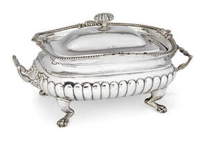 An impressive Scottish silver soup tureen, Edinburgh, c.1809, George Fenwick, the half-lobed rectangular body raised on four lion paw feet and decorated with g