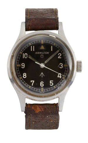 
	
		A stainless steel, British military issue wristwatch by Hamilton, the black dial with...