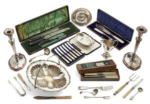 
	
		A quantity of silver plated items including: a pair of candlesticks with baluster stems...
