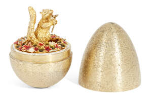 
	
		A silver gilt surprise egg by Stuart Devlin, London, c.1982, opening to reveal a squirrel...