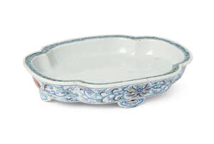 
	
		A Chinese porcelain doucai quatrilobe stand, Qianlong, with raised slightly everted rim...