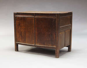 
	
		An oak blanket box, 17th Century and later, the rectangular hinged lid enclosing candle...