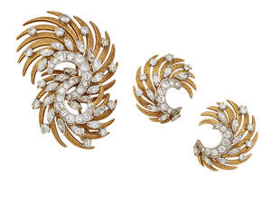 
	
		A diamond demi-parure, comprising: a brooch of stylised swirling feather design, with...