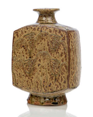 
	
		Bernard Leach (1887-1979), a stoneware bottle vase 
		c.1965, impressed partial seals to...
