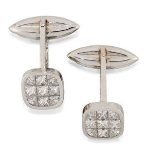 
	
		A pair of diamond cufflinks, of rounded square panel design composed of five princess-cut...