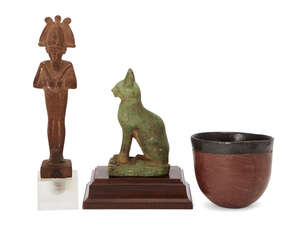 Three reproduction Egyptian style objects, including a round-bottomed black-top type vessel, 6.3cm, a wood figure of Osiris, 15cm including tang, and a green g
