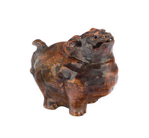 
	
		A Japanese raku pottery lion censer, Edo period, standing four square, with head raised,...