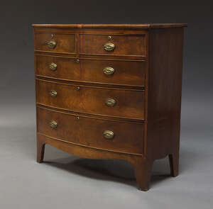 
	
		An early Victorian bow front chest, with two short over three long graduated drawers, on...