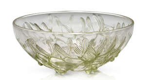 
	
		René Lalique (1860-1945), a clear and frosted glass bowl with green staining
		Gui No 1,...