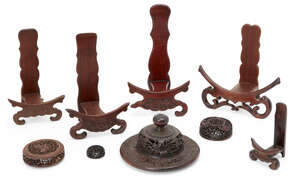 
	
		Five Chinese hardwood plate stands and four wood vase covers, 18th-early 20th century, 